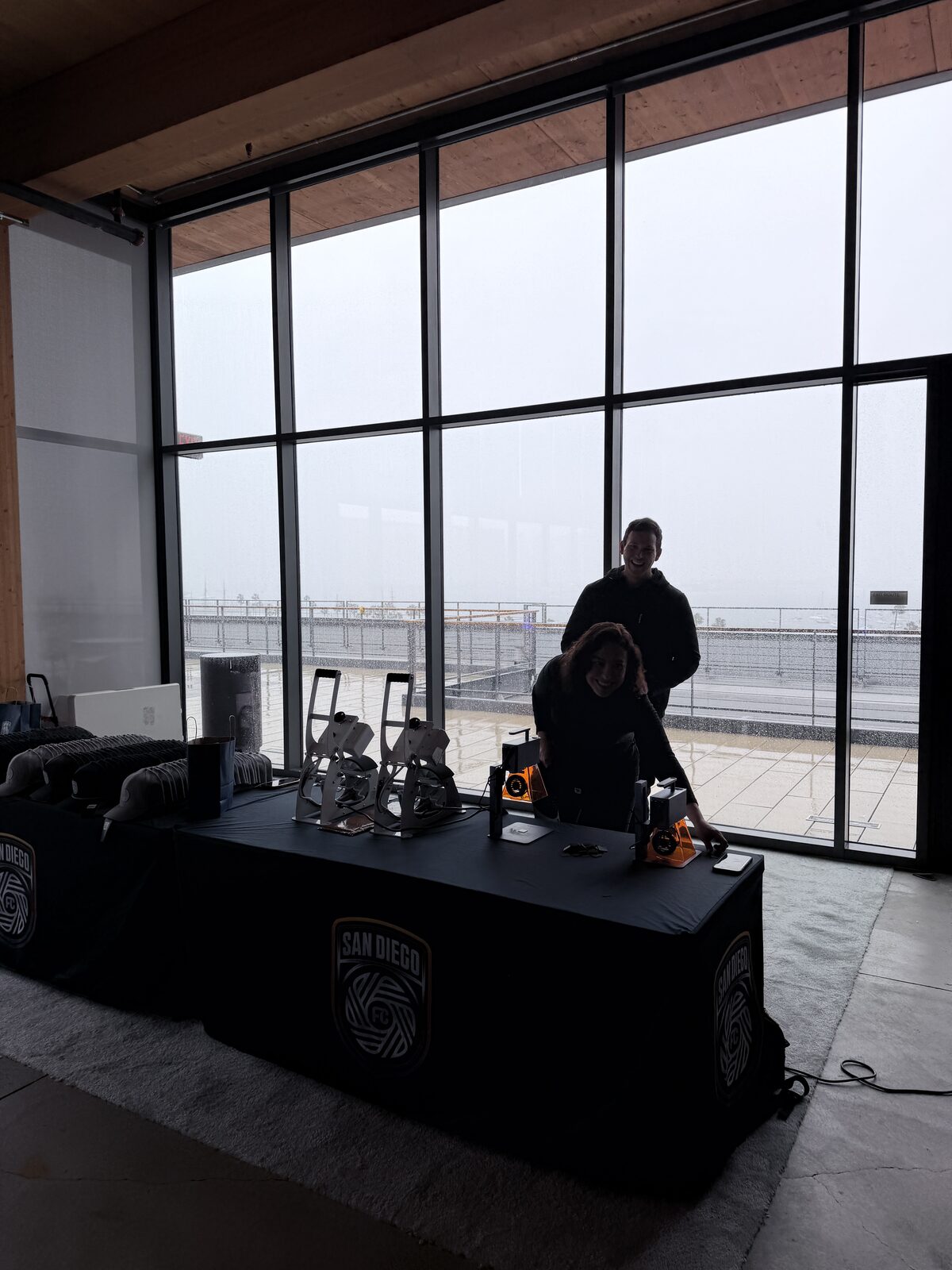 A live printing station running at an evening event as guests gather